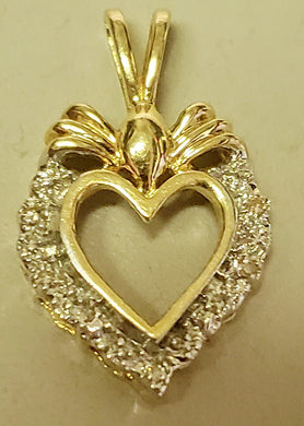 1.30 dwt 14K gold heart Pendant with 4 small round diamonds