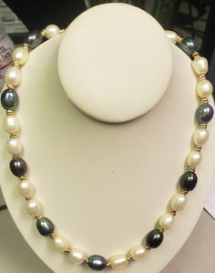 32.43 dwt 14K 24" gold white and blue bead necklace