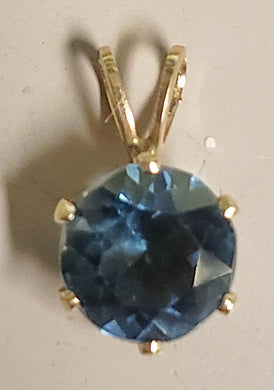 .60 dwt 14K gold pendant with large aqua gem