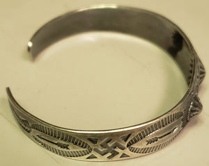 Vintage 9.16 dwt .925 sterling silver Navajo Native American bracelet with Whirling Log (swastika)