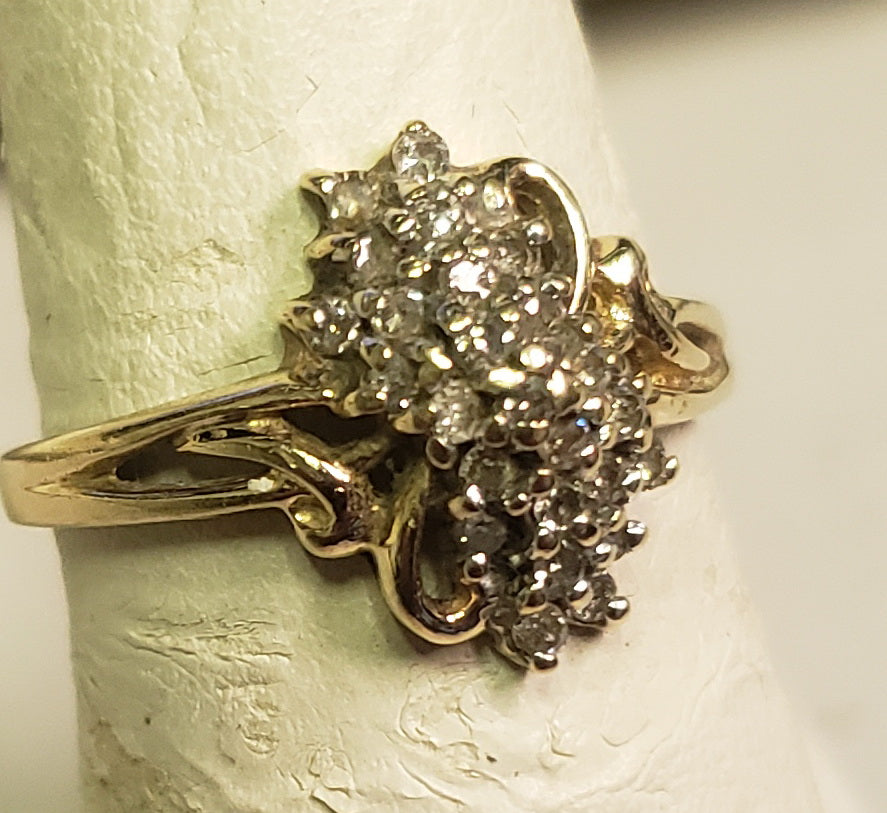 1.44 dwt 10K gold ring with many small diamonds - size 7