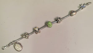14.24 dwt .925 sterling silver 7" bracelet with charms